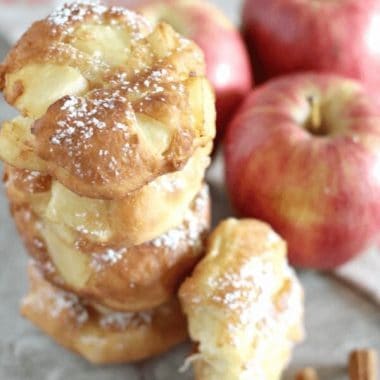 Apple fritter donut recipe stacked on a plate