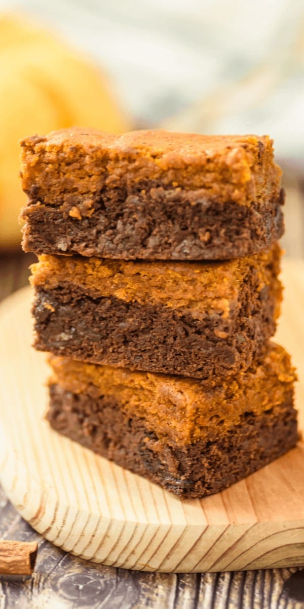 Pumpkin brownies stacked on a plate