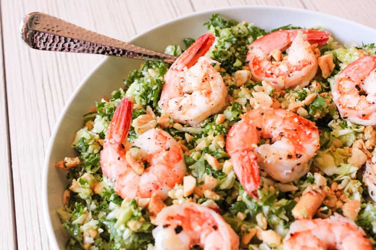 Shrimp and kale salad in a bowl