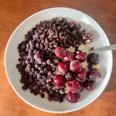 Berries thawing in bowl of oats - Daniel Fast breakfast idea